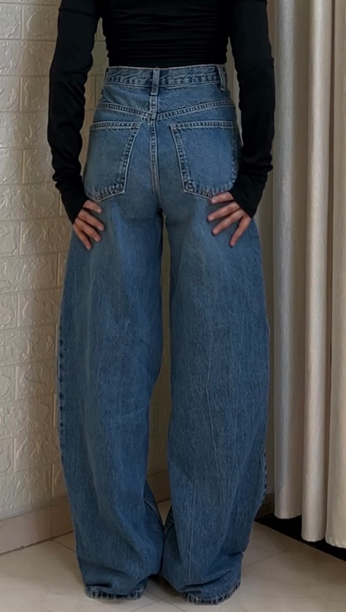 Criss cross waist wide leg jeans